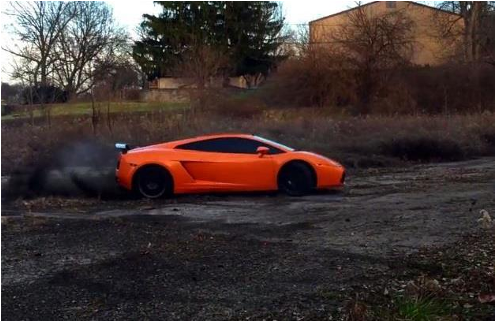 Lamborghini Countach spinning tires in mud