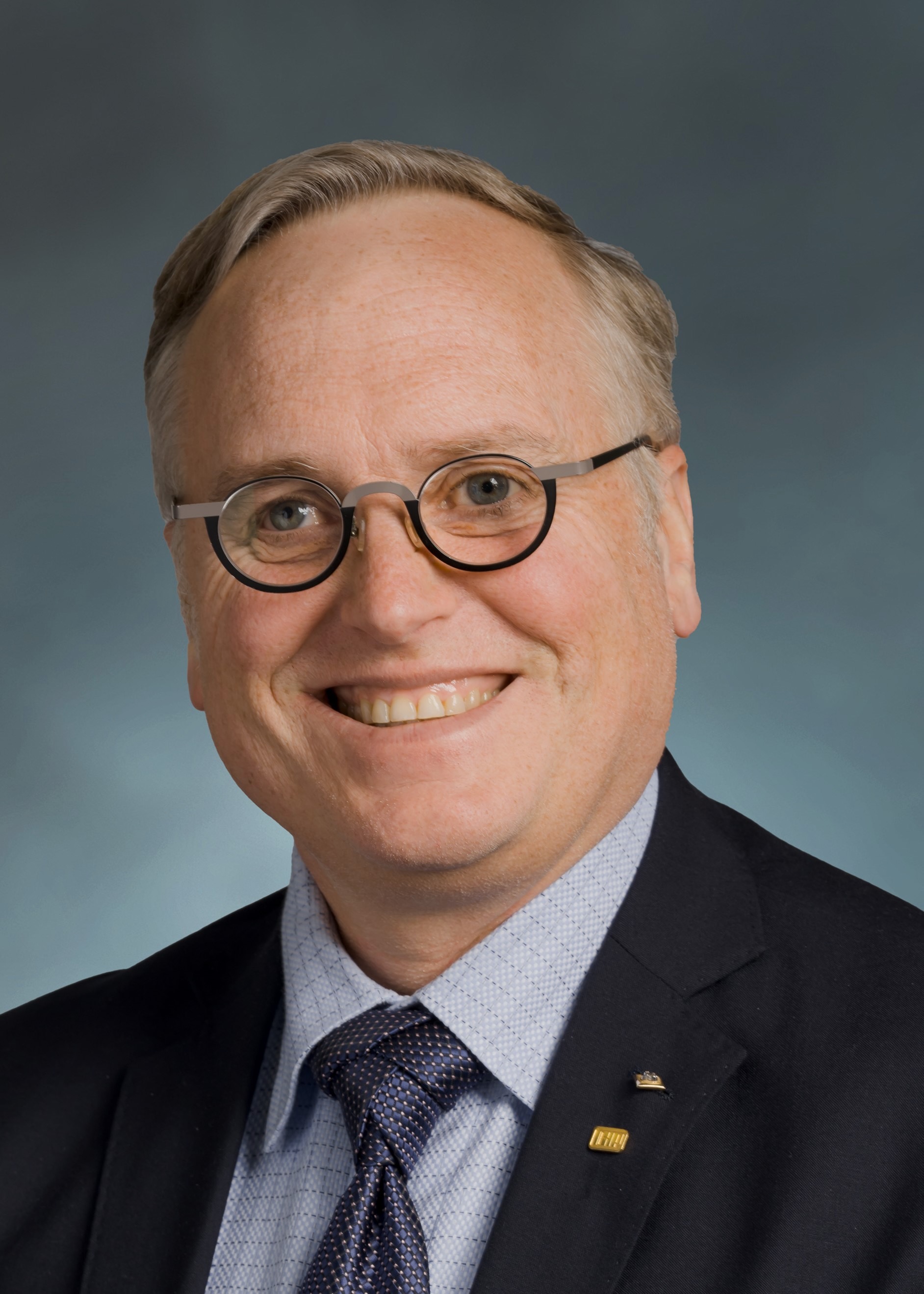 Dr.
			 Russ Meier